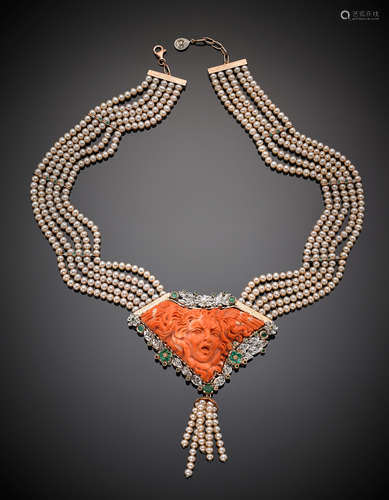 Four strand white cultured pearl necklace with pink 9K gold orange coral central carved as Medusa and accented with diamonds, and emeralds, in all g 183, length cm 53 circa.