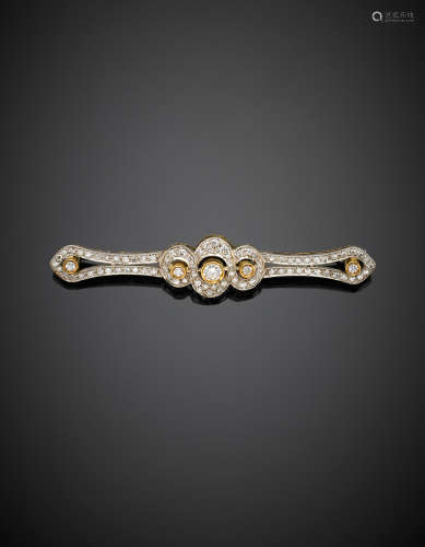 DAMIANIBi-coloured gold diamond bar brooch, g 8.39, length cm 6.30 circa. Signed DAMIANI