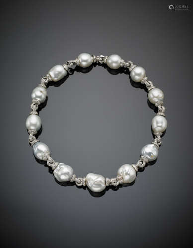 South Sea pearl necklace from mm 15.47 to mm 18.90 with white gold diamond spacers, g 131.80, length cm 43.00 circa.