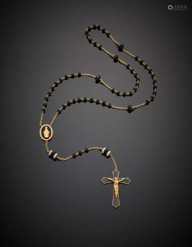 CRIVELLIRed gold rosary with black and colourless diamonds and black faceted beads, g 25.02, length cm 42.50 circa.