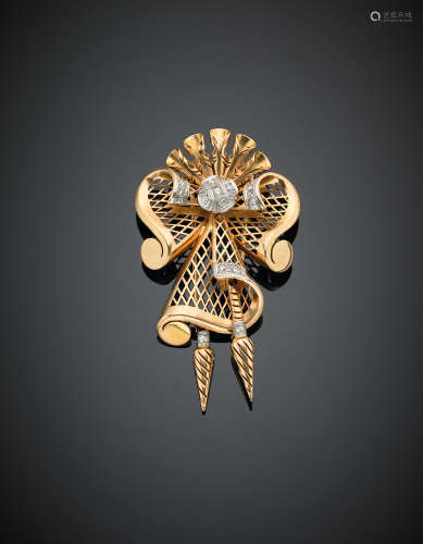 Bi-coloured gold, diamond pierced bow brooch decorated with tassels, g 23.40, length cm 6.90, width cm 4.10 circa.