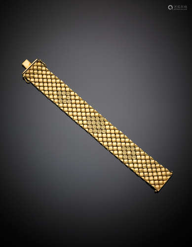 Yellow partly glazed gold modular bracelet, g 60.17, length cm 18.50, width cm 2.30 circa.