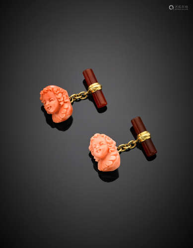 Yellow gold pink coral and carnelian carved head cufflinks, g 12.59.