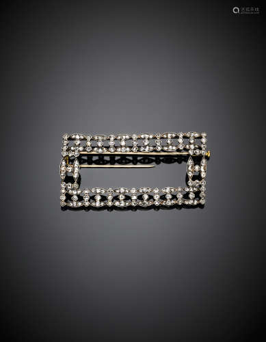 Yellow gold and silver, irregular diamond rectangular buckle brooch, g 17.99, length cm 6.50, width cm 3.02 circa.