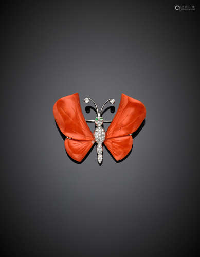 White gold diamond butterfly brooch, the wings in carved orange coral, g 18.30, width cm 4.8 circa.