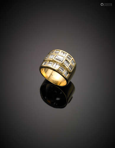 Yellow gold ct. 0.80 circa diamond band ring with baguette diamond surround, g 18.50.
