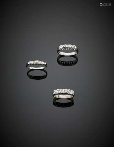 Lot of three white gold diamond wedding rings, different shapes and sizes, in all g 10.30.