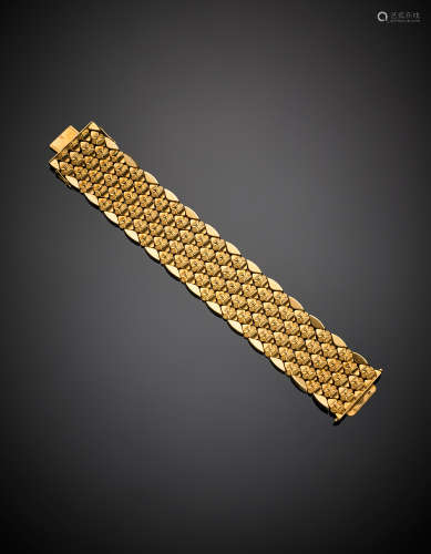 FOBYellow partly chiselled gold modular bracelet, g 57.80, length cm 19.80, h cm 3.70 circa. Marked FOB