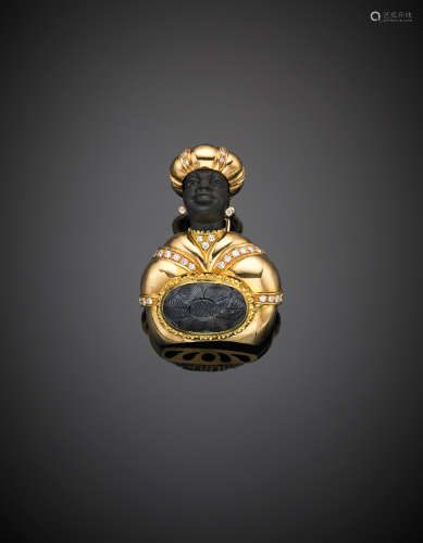 *MISSIAGLIAYellow gold, carved sapphire, ebony moor with turban brooch, diamond details, central sapphire ct. 24 circa, g 38.30,  length cm 5, width cm 3.60, h cm 2 circa.