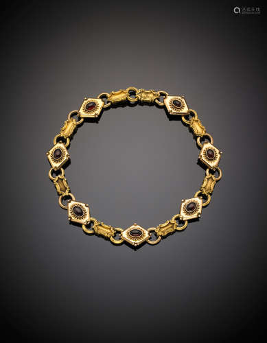 Yellow gold oval cabochon garnet modular necklace, g 57.84, length cm 40 circa.(slight defects)
