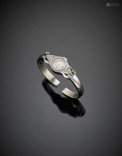 LONGINESLady's white gold diamond snap clasp wristwatch, g 20.9, diam. cm 4.8.