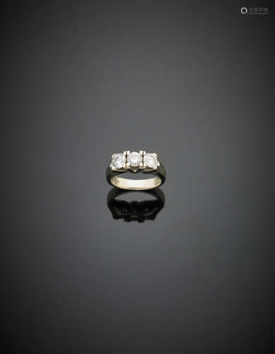 White gold three diamond ring,, in all ct. 1.00 circa g 5.90 size 7/47.