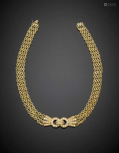 Yellow gold four-strand modular necklace with a central buckle accented with diamonds, g 60.1, length cm 39.5 circa.