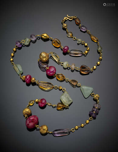 Long yellow gold chain necklace with gems of different shape, cut and nature, g 297.30, length cm 144.50 circa.