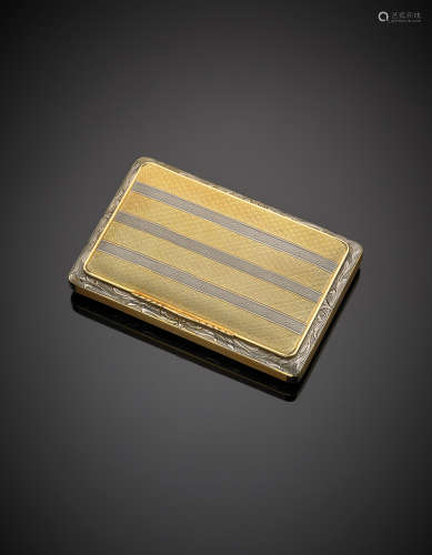 Bi-coloured chiselled and engraved gold snuffbox g 84.50, length cm 8.30, width cm 5.40, h cm 1.20 circa. Incomplete mark CI 21 750