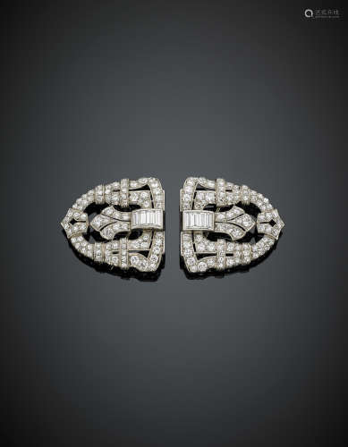 Round and baguette diamond platinum double brooch, in all ct. 7,20 circa, g 20.00, length cm 3.2 circa.