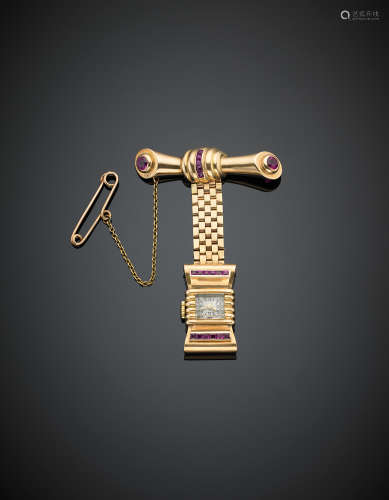Yellow gold and ruby pendant watch brooch, g 23.80, length cm 6.5, width cm 4.5 circa.