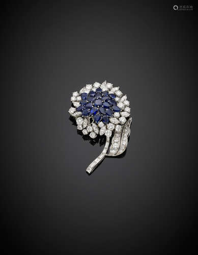 White gold, round and marquise diamond, round and pear shape sapphire flower brooch, no heat sapphire in all ct.7 and diamonds in all ct.7.50 circa g 20.01, length cm 5.60, width cm 3.50 circa, (losses).Appended gemmological report CISGEM n. 7570 22/09/2017, Milano