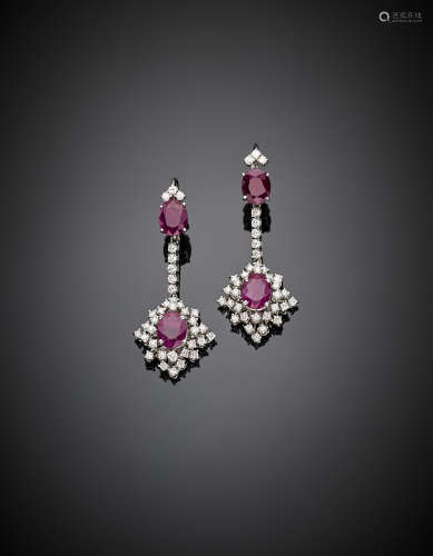 White gold round diamond, oval ruby pendant earrings, ruby in all ct. 7.40 circa, g 15.18, length cm 4.90 circa.