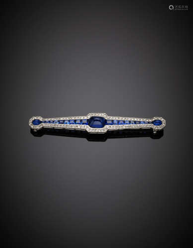 Platinum and white gold diamond , tapered sapphire brooch, inventory n. 26-877, g 7.50. 