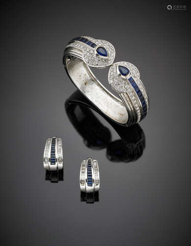 White gold lot composed of a 18K bangle and  9 K earrings, both with diamonds and sapphires (a few carré sapphire synthetic), in all g.74.80