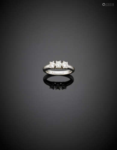 White gold three diamond ring, in all ct. 0.75 circa, g 4.58 size 15/55.