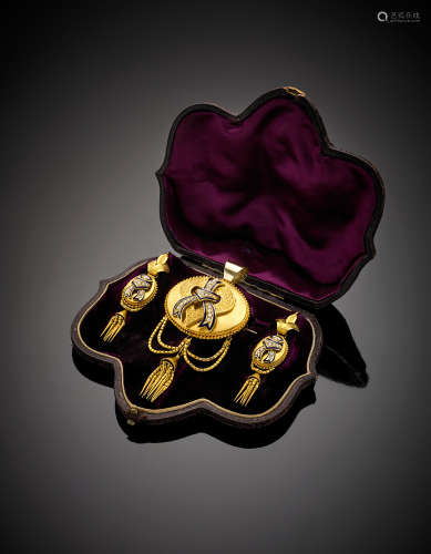 Yellow gold black enamel and small pearl jewellery set composed of brooch and earrings, with tassels, in all g 35.95. In original shaped case
