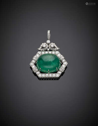 DAVID WEBBWhite gold diamond, in all ct. 8.20 circa hexagonal pendant with large cabochon emerald ct. 80 circa, small diamond leaves on top, g 39.86, length cm 6.20, width cm 4.20 circa.Appended Gemmological Report CISGEM n.7919 19/10/2017 Milano.