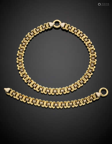 Bi-coloured gold modular jewellery set comprising a joinable necklace and bracelet g 103.39. Necklace length cm 43.5 circa, bracelet cm 20 circa. Marked 1788 VI
