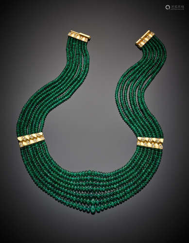 *MISSIAGLIASeven strand graduated emerald bead necklace with yellow gold and diamond spacers and clasp, g 117.35, length cm 44.70 circa.