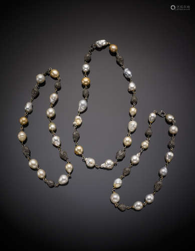 Three attachable white, grey and golden South Sea baroque pearl necklaces with yellow and black gold, tinted diamond-set with bead and chain spacers in all g 260.8, length cm 59.5 52.5 46 circa.(losses)