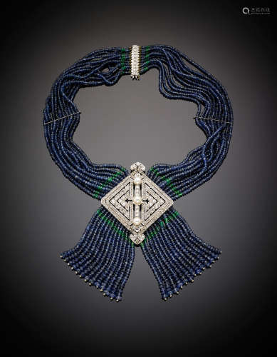 Multi strand faceted emerald and sapphire bead necklace, centered by a white gold diamond and pearl lozenge underlined by a fringe of the same beads, white gold diamond clasp, g 146.67, length cm 38.50 circa. French hallmarks Original case