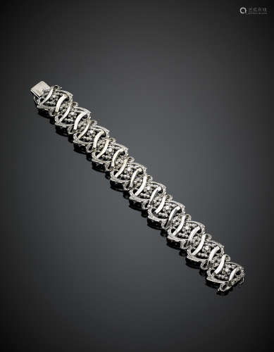 White gold bracelet accented with diamonds, g 67.70, length cm 17.50, h cm 2.10 circa.