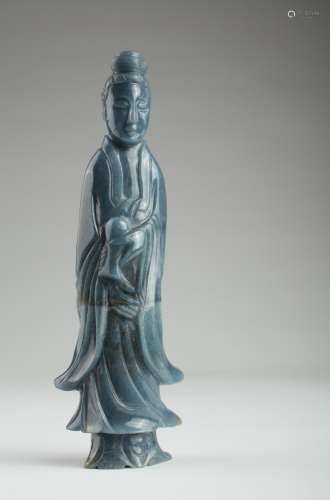 A rare Chinese blue jadeite Guanyin figure,