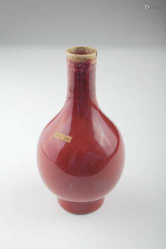 A Chinese Sang de Boeuf vase,