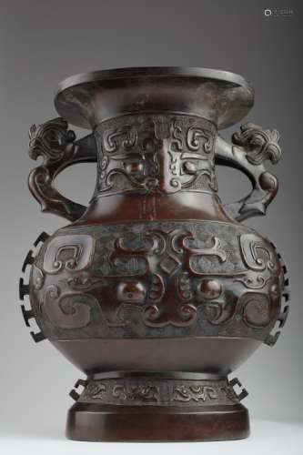 A Chinese bronze vessel of archaic form,