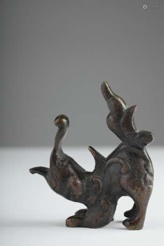 A Chinese bronze chimeric elephant figure,