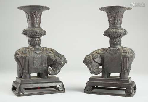 A pair of Chinese bronze 'elephant' altar vases,