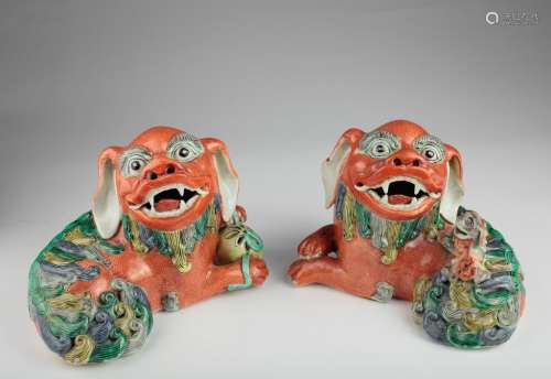 large imposing pair of Chinese iron red Foo Dogs