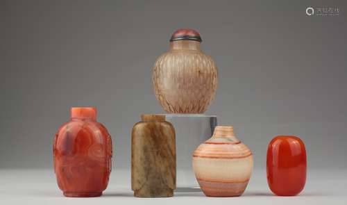 A group of five Chinese hardstone snuff bottles,