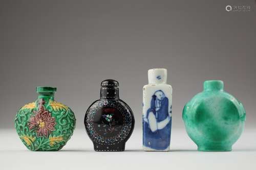 A lac Burgaute and three ceramic snuff bottles,