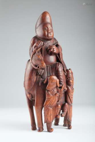 A large Chinese carved bamboo Xuanzang group,