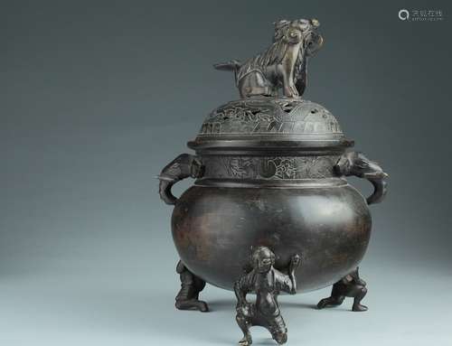 A Chinese bronze covered tripod censer,