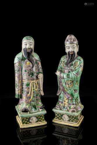 A pair of Chinese biscuit porcelain Immortals,