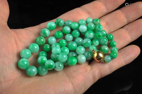 GIA green jadeite beaded necklace,