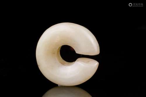 A rare archaic Chinese white jade ring