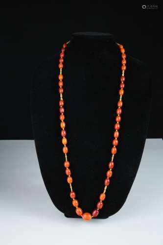A butterscotch amber bead necklace,