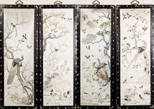 A SET OF FOUR EMBROIDERIES IN MOTHER-OF-PEARL HARDWOOD FRAME