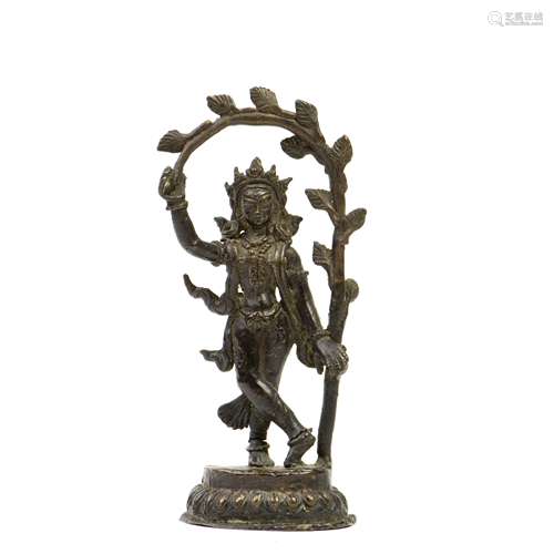 AN GILT-BRONZE INDIAN STATUE, 20TH CENTURY