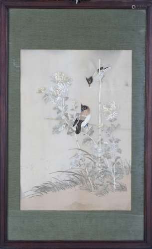 A FRAMED FLOWER AND BIRD EMBROIDERY